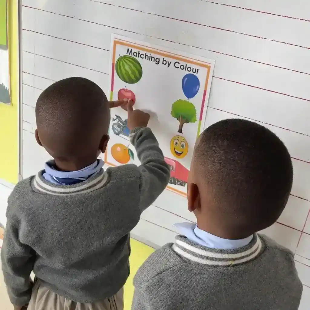 Children doing colour matching art activity